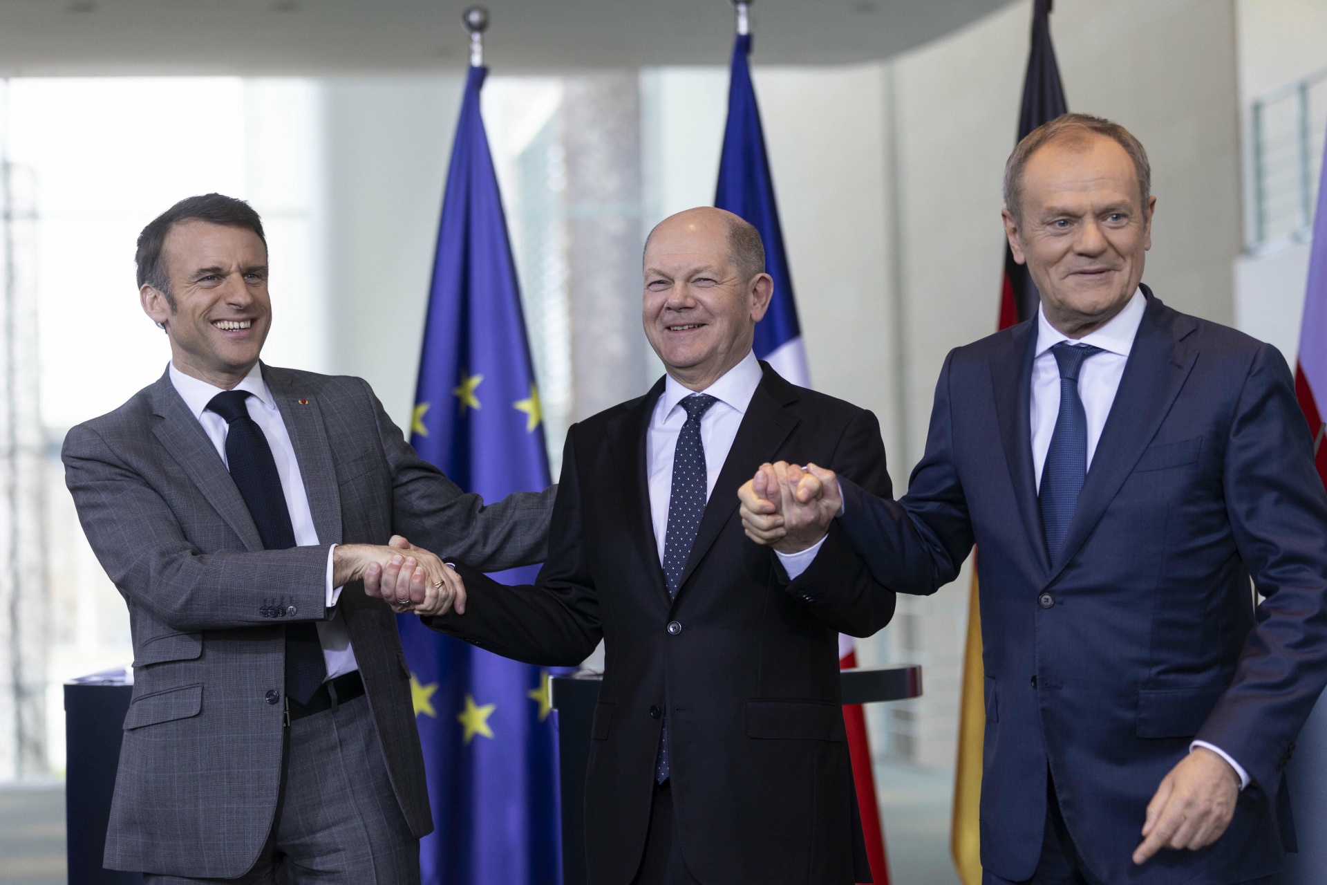 Photo of Donald Tusk, Prime Minister of Poland (R), Olaf Scholz, Federal Chancellor of Germany (M), and Emmanuel Macron, President of France (L), taken at a press conference in the Federal Chancellery in Berlin, March 15, 2024.